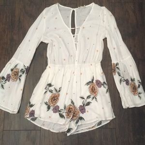 White flowered jumpsuit with pockets